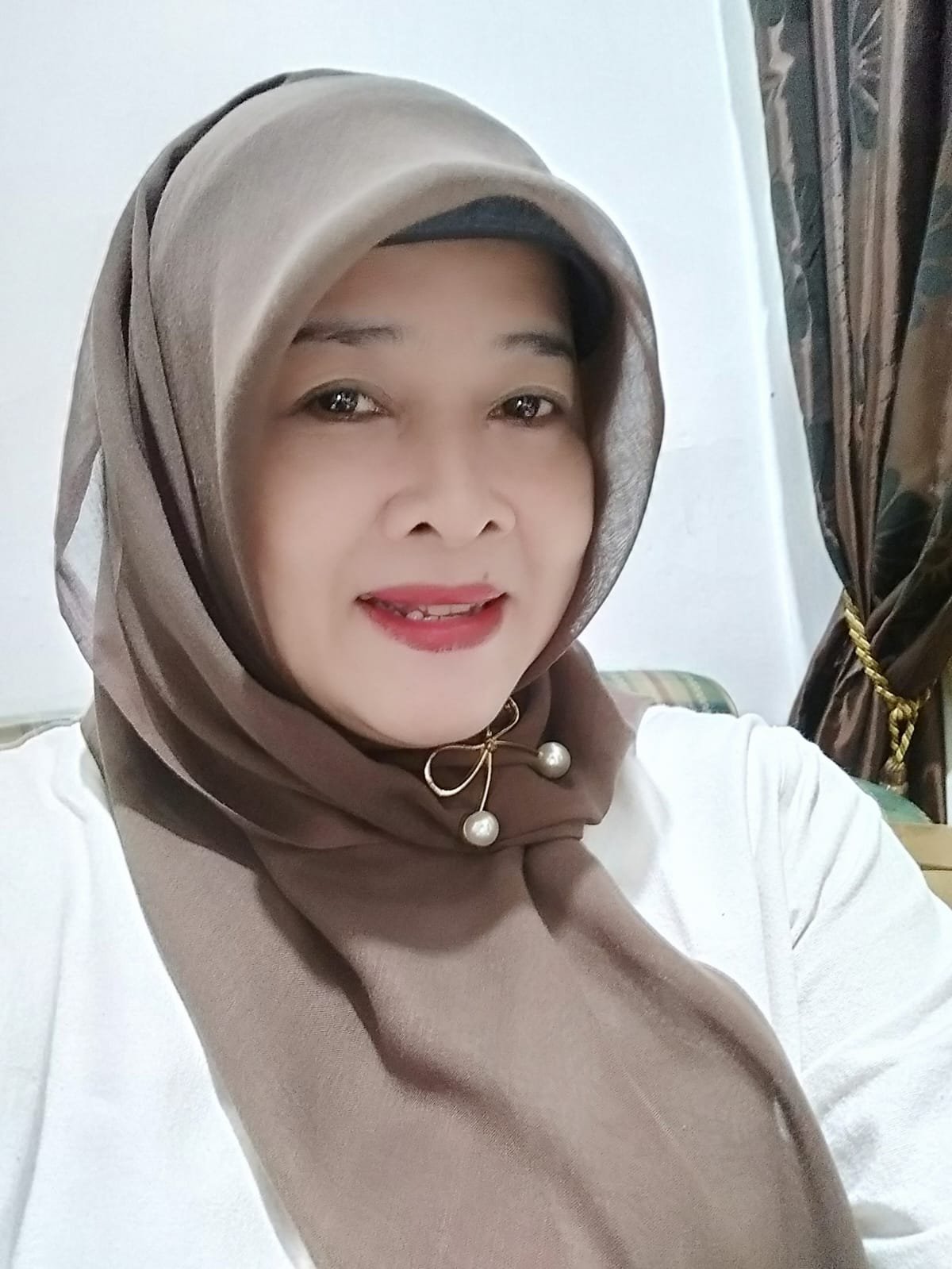 Dra. Apriyani Sulistyowati